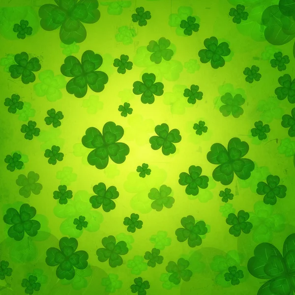 Gestreepte vier-gebladerde shamrocks in groene oud papier achtergrond — Stockfoto