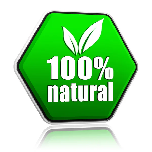 100% натуральный с зеленой кнопкой на листе — стоковое фото