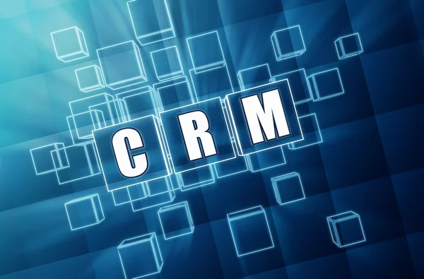 CRM in blauw glas kubussen — Stockfoto