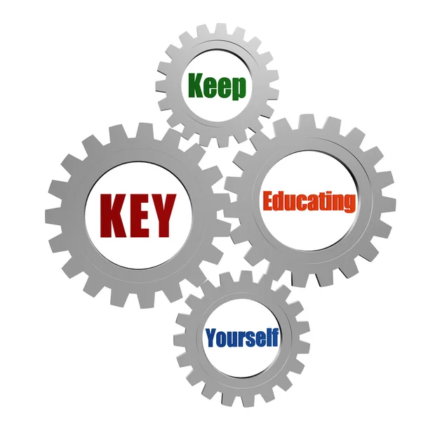 KEY - keep educating yourself in silver gears — Stock Photo, Image