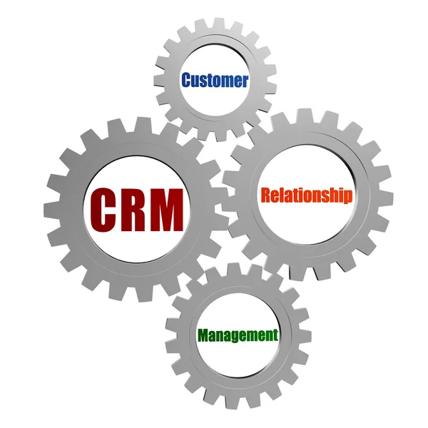 CRM - gestión de relaciones con el cliente en engranajes grises plateados — Foto de Stock