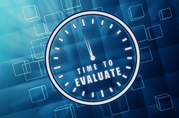 Time for evaluate in clock symbol in blue glass cubes — Stock Photo, Image