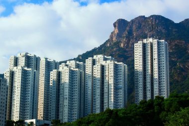 paisaje de vivienda de Hong kong bajo roca León