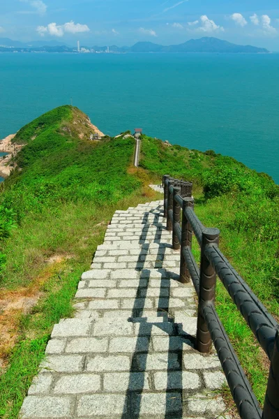 Hiking path surrounded by the sea — Stock Photo, Image