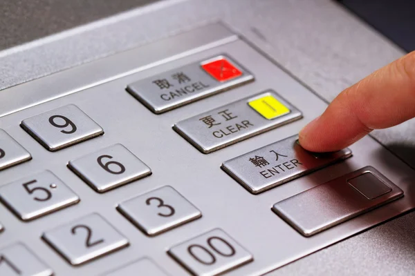 Entering personal identification number on ATM — Stock Photo, Image