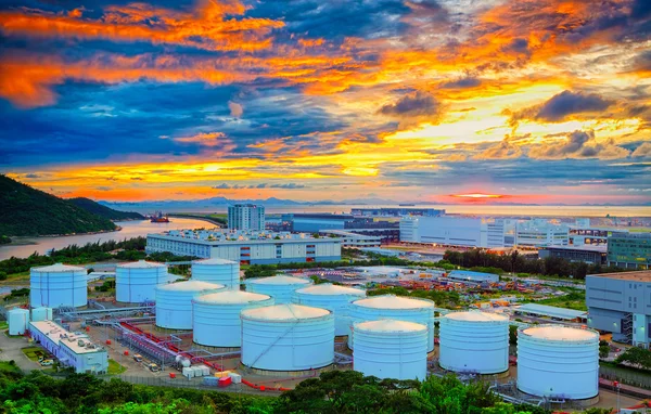 Oil tanks at sunset — Stock Photo, Image