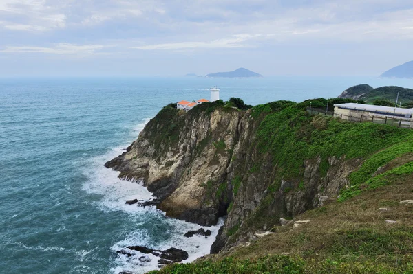 Beyaz küçük bir deniz feneri. Hong kong — Stok fotoğraf