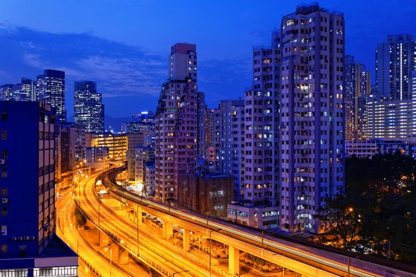 Busy highway train traffic night in finance urban — Stock Photo, Image