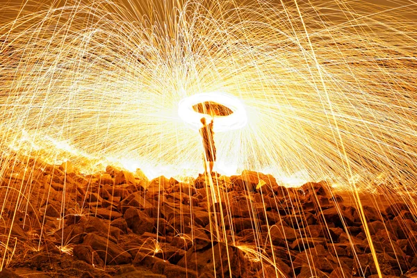 Burning steel wool fireworks