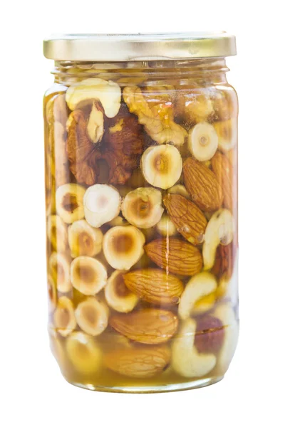 蜂蜜中的坚果 — 图库照片