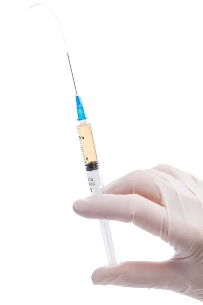 Syringe with vaccine in hand — Stock Photo, Image