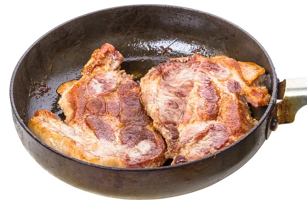 Geroosterd varkensvlees in een koekenpan — Stockfoto