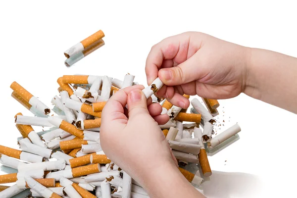 Child breaks a cigarette — Stock Photo, Image