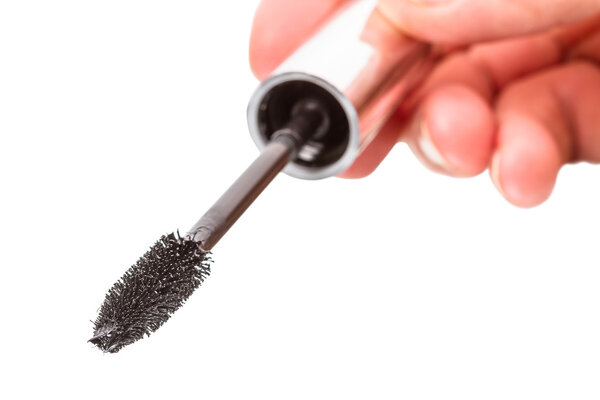 Brush with mascara in hand