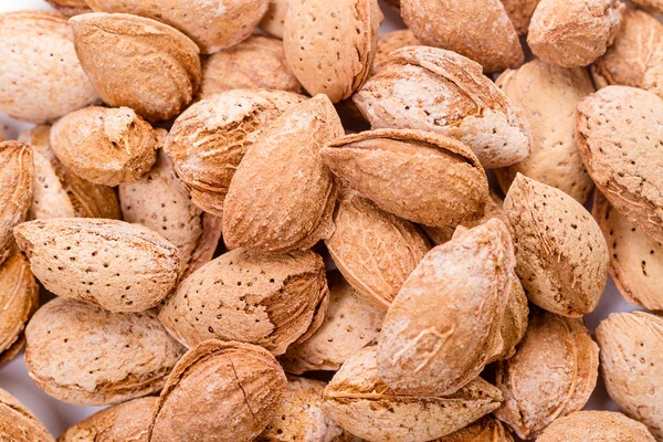 Pile of salted almonds in the shell — Stock Photo, Image