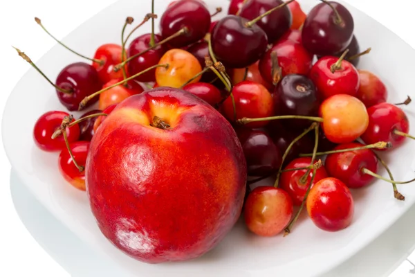 Nectarine and cherries — Stock Photo, Image