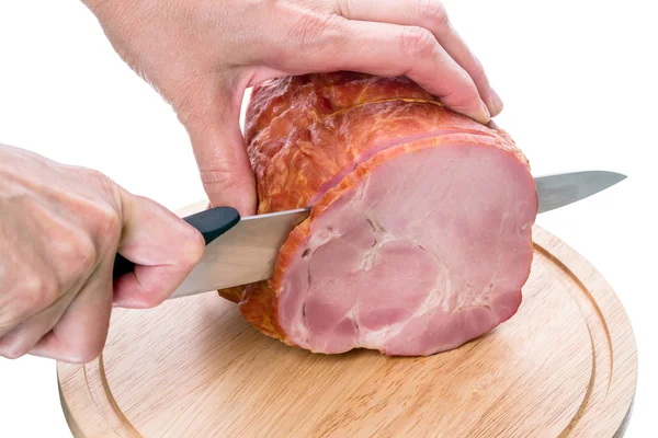 Cutting smoked meat on cutting board — Stock Photo, Image