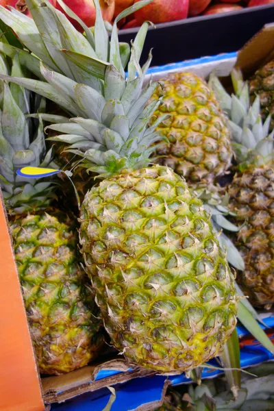 Fresh pineapple in a box — Stock Photo, Image