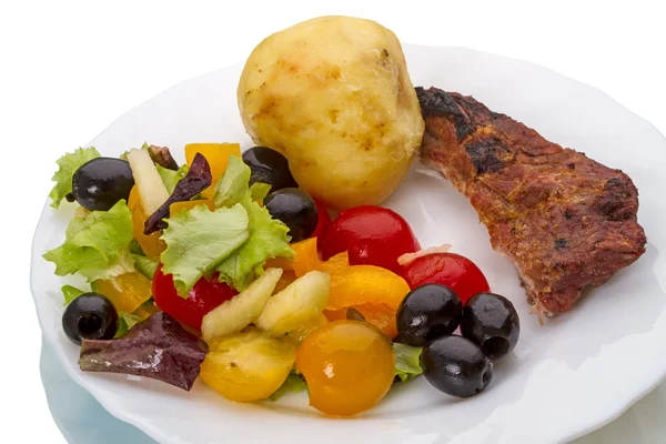 Gebakken vlees en fruit salade — Stockfoto