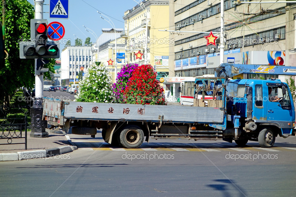 Truck Transports Flower Beds Stock Photo Truck Transports Flower Beds Stock Photo