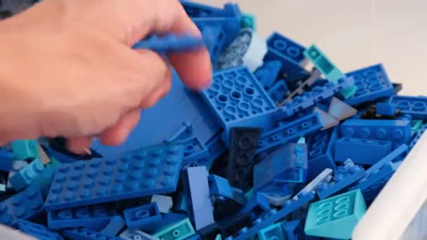 Tambov Russian Federation July 2021 Person Digging Pile Blue Lego — Vídeo de Stock
