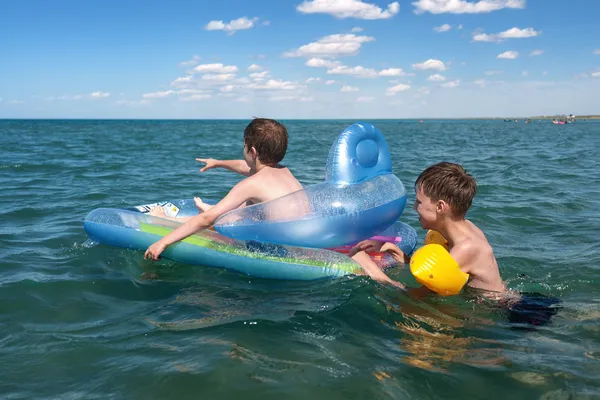 Swimming boys — Stock Photo, Image