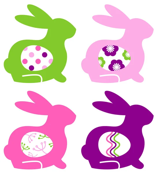 Lapins colorés abstraits avec oeufs mis isolé sur blanc — Image vectorielle