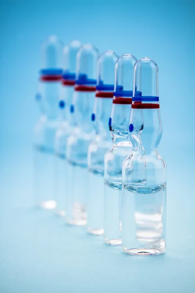 Ampollas sobre fondo azul — Foto de Stock