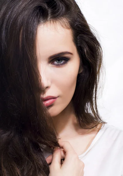 Beauty woman face with haircut. Brunette.Brown hair. — Stock Photo, Image