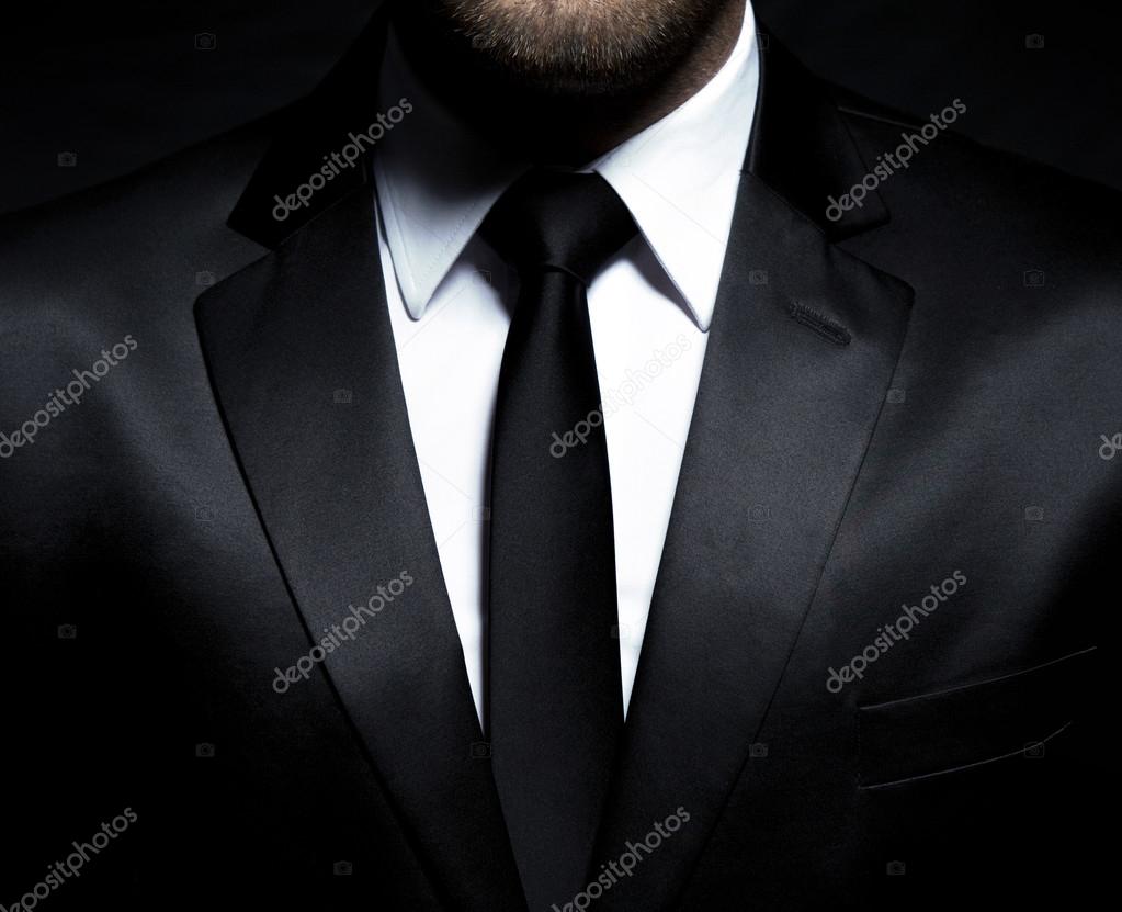 Gentleman in black suit and tie Stock Photo by ©Markomarcello 42556023
