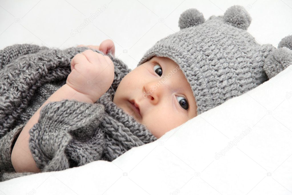 Baby in gray hat