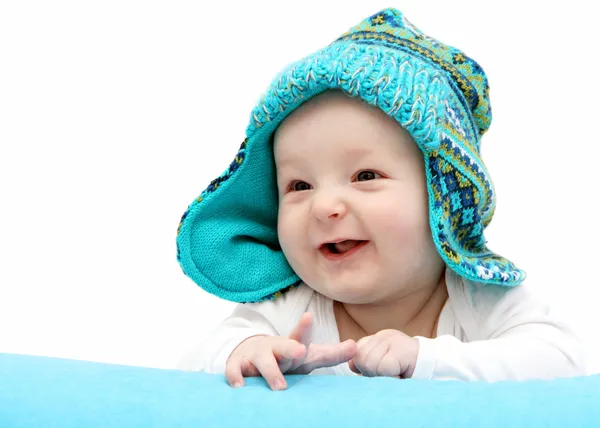 Happy baby in knitted hat — Stock Photo, Image