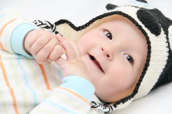 Sonriente bebé se encuentra en la espalda Imagen De Stock