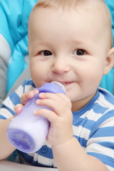 Baby with bottle — Stock Photo, Image