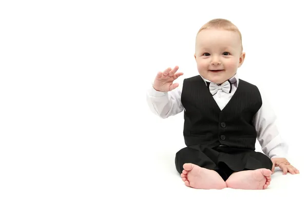 Glücklicher kleiner Junge im Anzug Stockfoto