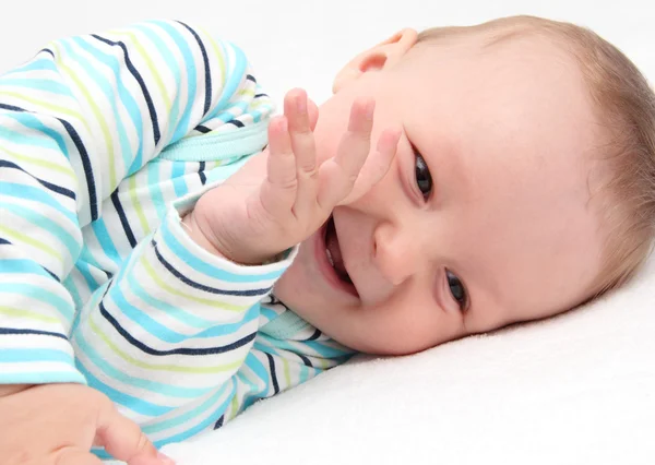 Kisbaba, nevető Stock Kép