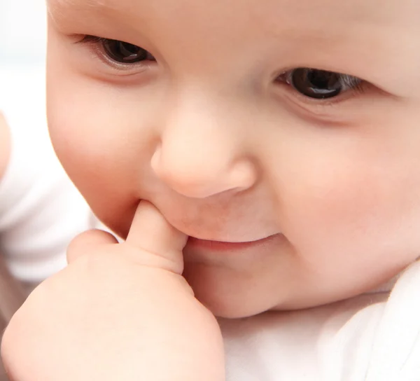 Schönes Baby aus nächster Nähe Stockbild