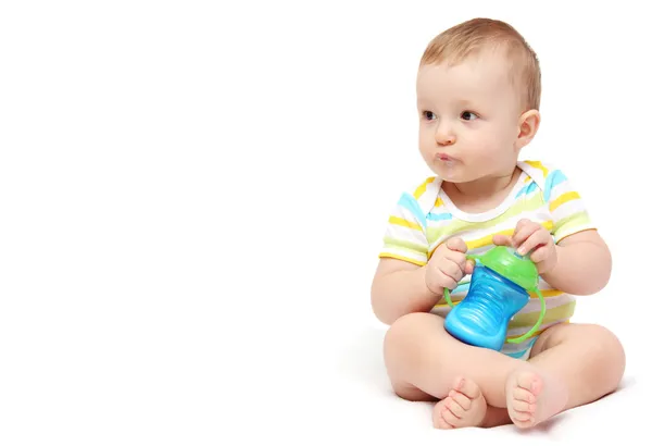 Baby boy with milk bottle — Stock Photo, Image