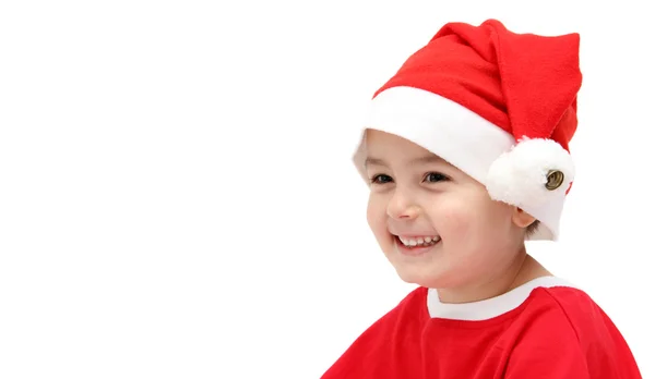 Criança feliz em chapéu de santa claus — Fotografia de Stock