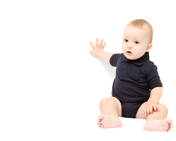 赤ちゃん白い背景の上の手で示す — ストック写真