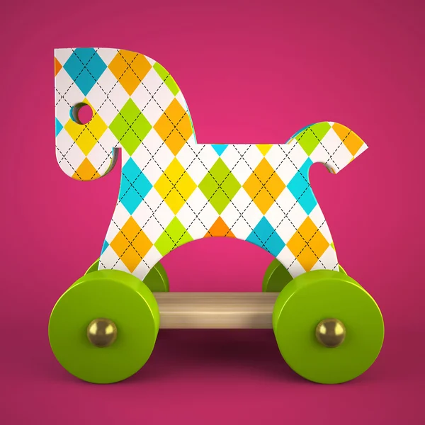 Дерев'яна іграшкова кінь на фіолетовому фоні — стокове фото