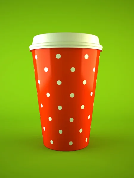 Koffie beker polka dot geïsoleerd op groene achtergrond — Stockfoto