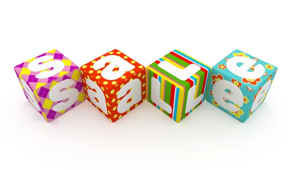 Sale word on colorful fabric cubes on white background — Stock Photo, Image