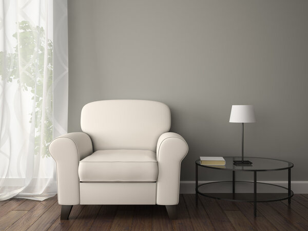 Part of interior with white armchair