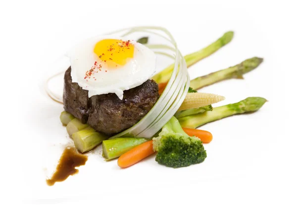 Steak with eggs — Stock Photo, Image