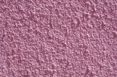 Pembe taş duvar dokusu arkaplanı yakın plan. 