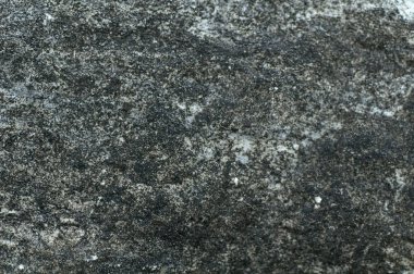 Taş gibi. Koyu taşın arka plan dokusu yakın plan. Üst manzara, Poti 'deki setten taş..