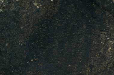 Taş gibi. Koyu taşın arka plan dokusu yakın plan. Üst manzara, Poti 'deki setten taş..