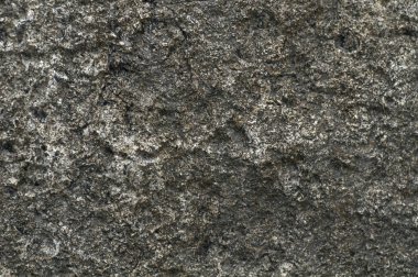 Taş gibi. Koyu taşın arka plan dokusu yakın plan. Üst manzara, Poti 'deki setten taş..