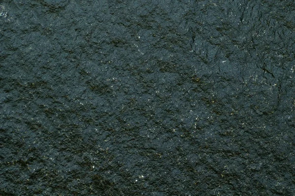 黑石特写的背景质感 顶部视图 Poti路堤上的石头 — 图库照片